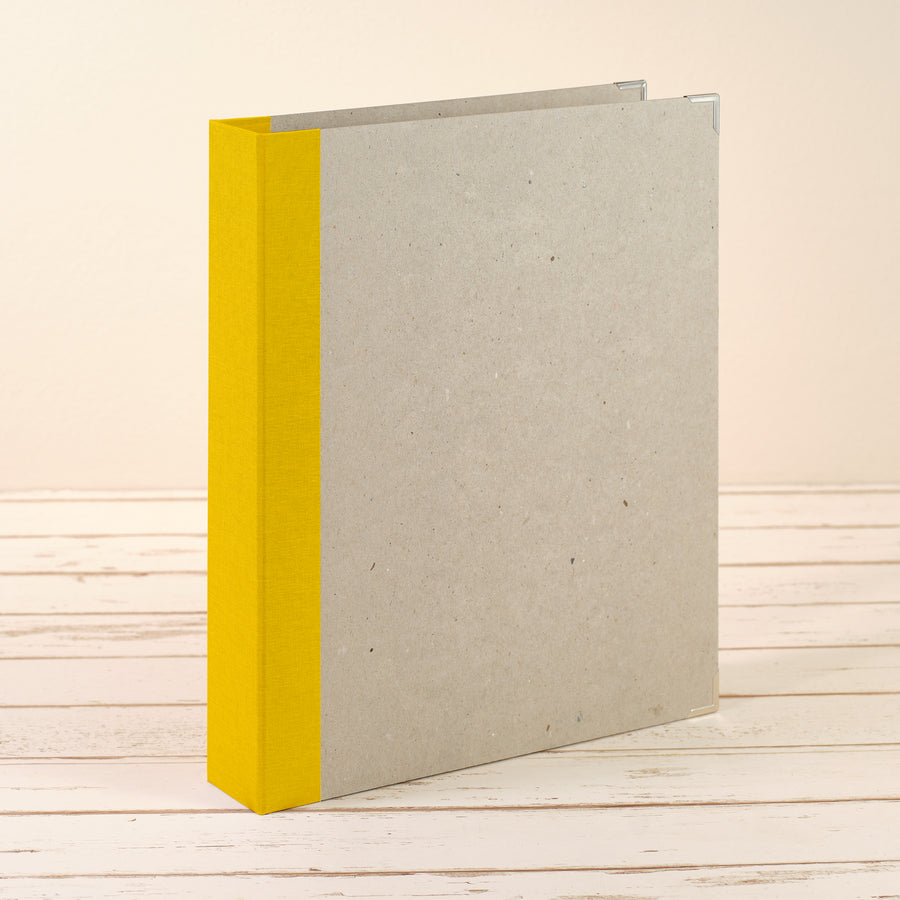 A4 Ordner mit gelbem Leinenrücken